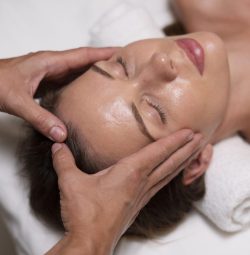 relaxed-woman-getting-massage-close-up